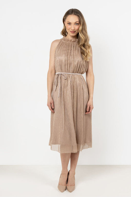 Female model stands front-facing with arms relaxed by her sides against a white studio backdrop wearing a sleeveless high-neck pleated metallic champagne midi dress with a thin waist belt