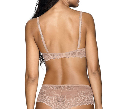 Female model seen from behind wearing a nude lace balconette bra and matching lace boyshort panties standing against a white background