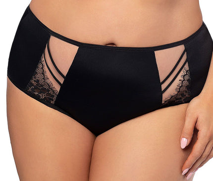 Curvy model stands against a white background wearing black high-waisted knickers in smooth fabric with sheer mesh and lace panels