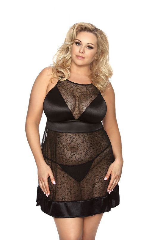 Plus-size model wearing a black lace and satin babydoll with A-line cut standing facing forward against a white background