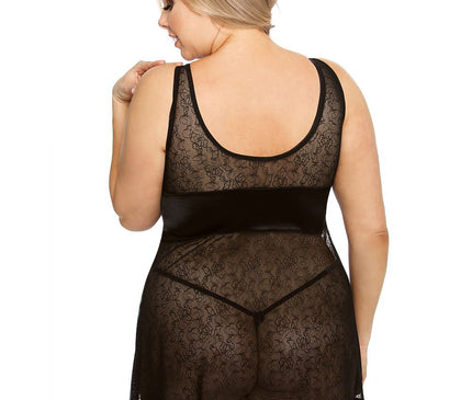 Plus-size model in a black lace and satin sleeveless babydoll dress with a scoop back and flared hem poses back to camera against a white background