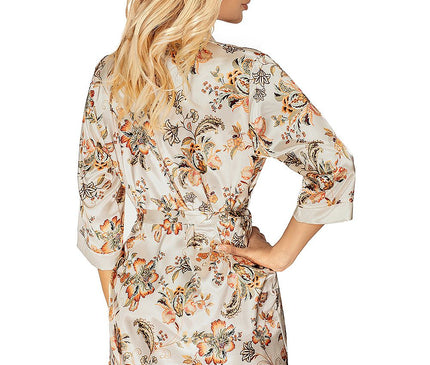 Female model in a short cream satin floral print robe with three-quarter sleeves standing with hands on hips against a white background