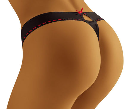 Female model wearing a black microfibre low-cut thong with red stitching and bow detail shown from the side against a white background