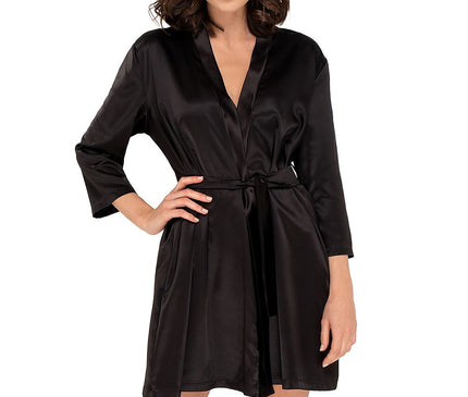 Female model wearing a short black satin wrap robe with three-quarter sleeves standing with one hand on hip against a plain white background