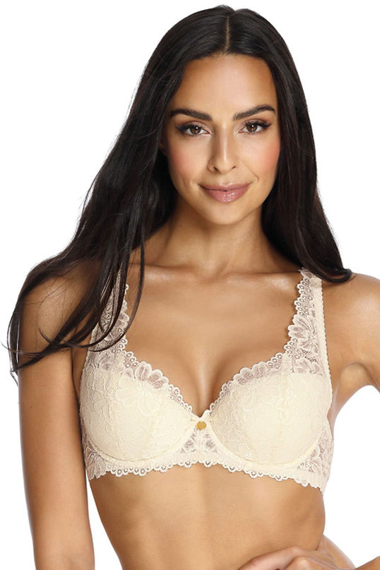 A female model stands facing forward wearing a cream lace underwired bra against a plain white background