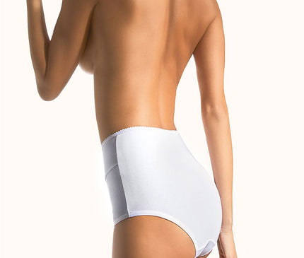 Model wearing high-waisted white cotton briefs in a side-back profile pose against a plain white backdrop