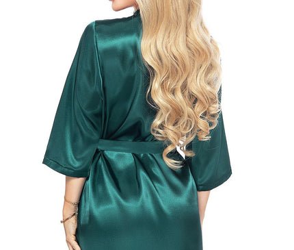 Model wearing an emerald green satin wrap robe with three-quarter sleeves standing back to the camera with her head turned to the side against a plain white background