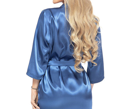 Blonde model wearing a knee-length blue satin belted robe with three-quarter sleeves standing back to camera with head turned to the side against a white background
