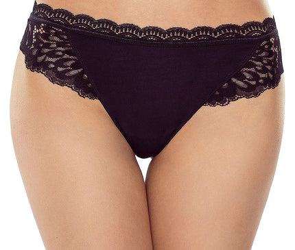 Female model wearing black lace trimmed bikini cut briefs standing against a plain white background