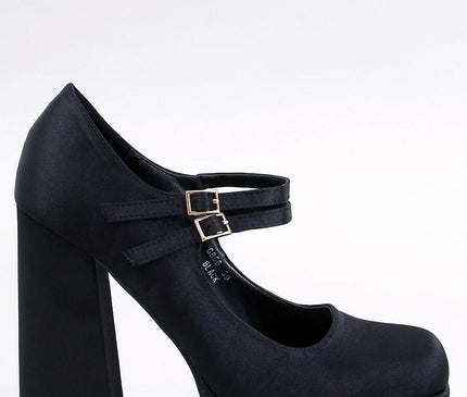 Black satin platform Mary Jane pump with double ankle straps and chunky block heel in side view on a white background