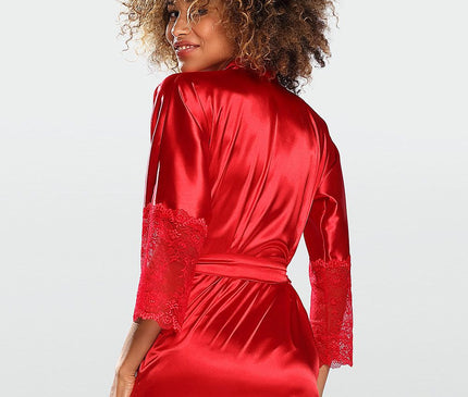 Female model in a short red satin robe with lace-trimmed three-quarter sleeves turning with a smile against a plain white background
