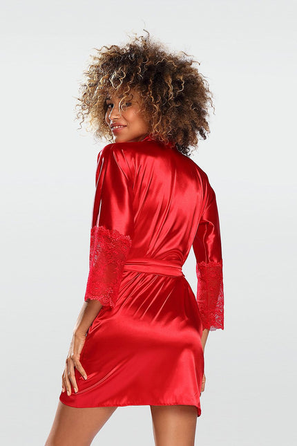 Female model in a short red satin robe with lace-trimmed three-quarter sleeves turning with a smile against a plain white background